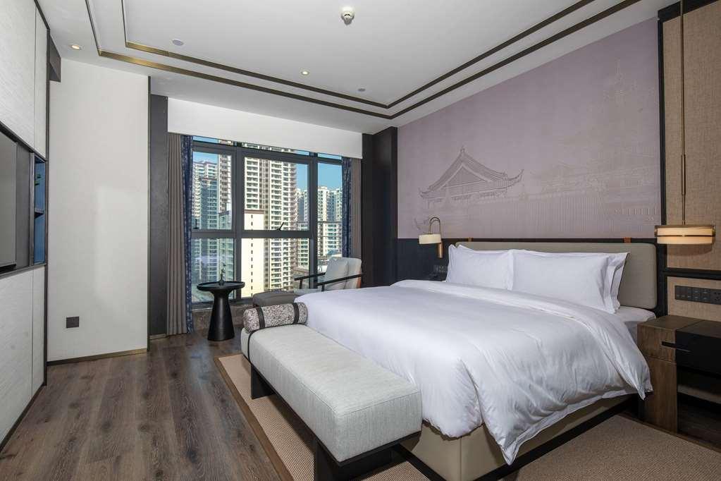 Отель Ramada By Wyndham Shaoyang County West Номер фото